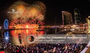 Large crowds celebrating New Year's Eve in Dubai near Burj Khalifa with fireworks and festive atmosphere