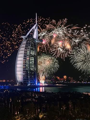 Burj Al Arab New Year fireworks viewed from a luxury yacht cruise in Dubai